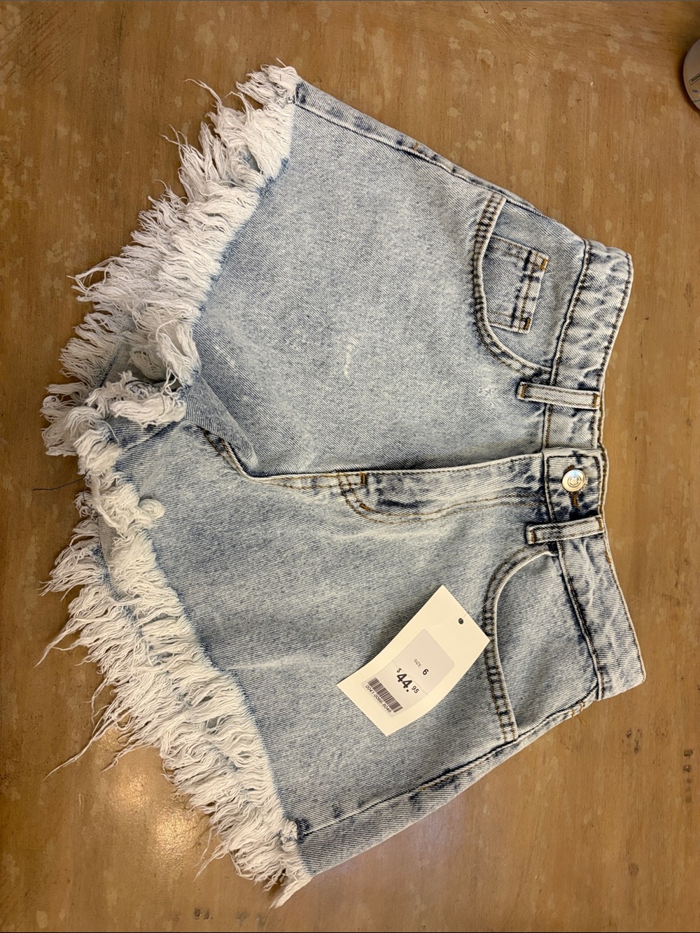 Frayed Hem Light Blue Denim Women's Shorts